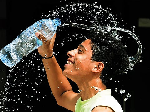 Experts recommend drinking two to three litres of water per day given the UAE’s summer heat.