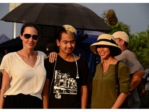 Angelina Jolie, Maddox Jolie-Pitt and Loung Ung