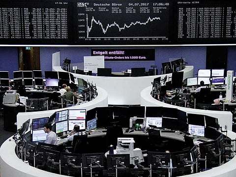 Traders at the stock exchange in Frankfurt.