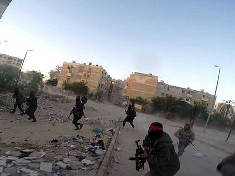 This photo posted on a file sharing website, January 11, 2017, by Daesh in Sinai, shows a deadly attack by militants on an Egyptian police checkpoint, in El Arish, north Sinai, Egypt.