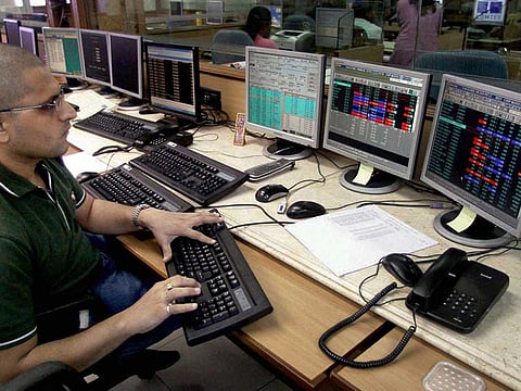 A broker seen at the National Stock Exchange in Mumbai. While analysts largely warn that damage from social distancing will last for longer in most virus-ravaged emerging markets, some see this as an opportune time to start investing in them.
