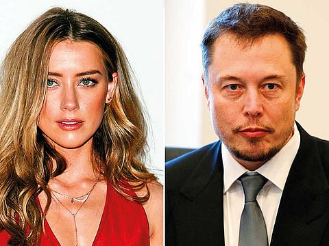 Amber Heard (L) and Elon Musk.