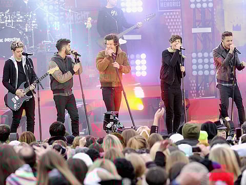 Niall Horan, Liam Payne, Harry Styles, Louis Tomlinson and Zayn Malik of One Direction perform at Rumsey Playfield on November 26, 2013 in New York City.