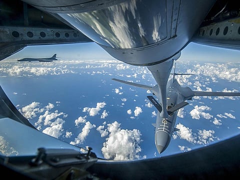 File: This US Air Force handout photo obtained September 23, 2017 shows an Air Force B-1B Lancer receiving fuel from a KC-135 Stratotanker near the East China Sea, on September 18, 2017.  US bombers accompanied by fighter jets flew off the east coast of North Korea on September 23, 2017 in a show of force designed to project American military power in the face of Pyongyang's weapons programs, the Pentagon said.