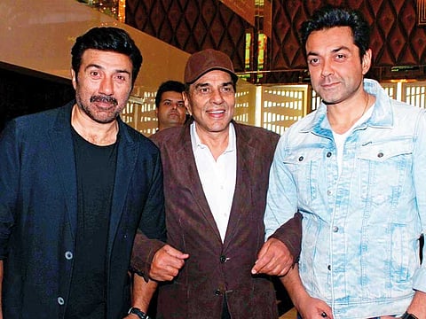 Actors Sunny, Dharmendra and Bobby Deol.