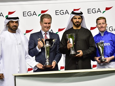 Hugh Anderson, Godolphin Managing Director (UK and Dubai), is flanked by trainer Saeed Bin Surour, jockey Patrick Cosgrave and Khalid Essa Buhumaid.