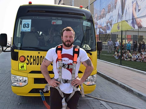 ‘Strongest man’ Boyd pulls Dubai school bus