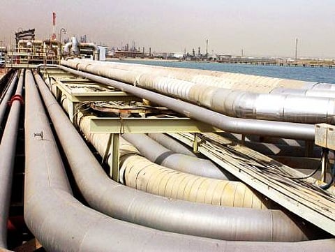 Pipes lead from the Mina Al Ahmadi refinery to the South Pier loading area in Kuwait City. Kuwait had undertaken to cut 131,000 barrels a day under its pledge to Opec.