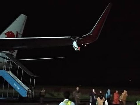 Photo posted by Facebook user Irsan Hidayat showing damage to the plane
