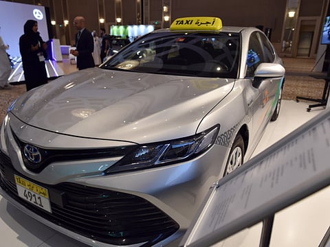The hybrid taxi, which combines a battery and internal combustion engine, displayed at the International Conference and exhibition on Future Mobility, hosted by the Emirates Authority for Standardisation and Metrology (ESMA)at the St Regis hotel in Sadiyat Island Abu Dhabi yesterday Photo Ahmed Kutty/Gulf News