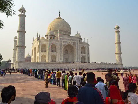A long queue of visitors seen at the Taj Mahal, in Agra.