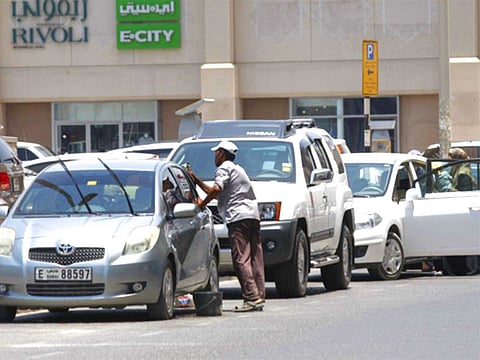 Under new rules, car washing will be limited to mall parking, petrol stations and car cleaning service shops in Sharjah.