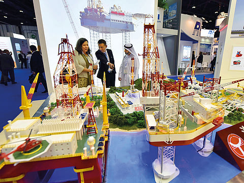 Delegates at a pavilion during last year’s Adipec. Shifts in economic powers, renewable energy, and technological innovation will be among issues to be discussed this year.