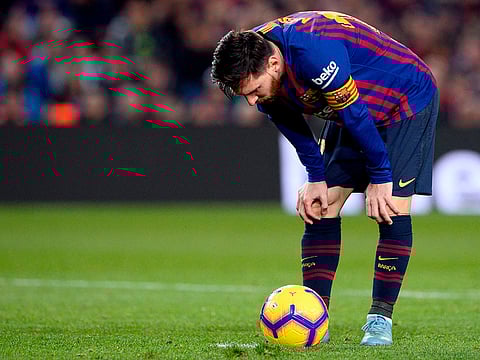 Lionel Messi prepares to take a Barcelona penalty.
