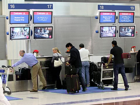 Passengers at Dubai International airport.