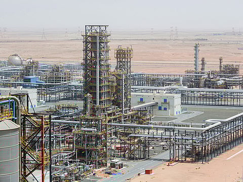 Cracking towers stand at the Ruwais refinery and petrochemical complex, operated by Abu Dhabi National Oil Co. in Al Ruwais, UAE, on May 14, 2018.