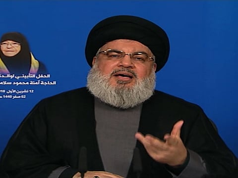 Leader of the Lebanon's Shiite Hezbollah movement Hassan Nasrallah giving a televised speech at an unknown location.
