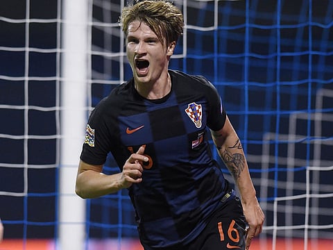 Croatia's Tin Jedvaj celebrates after scoring a goal.