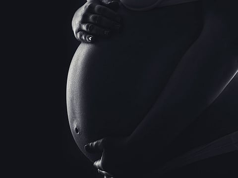 A pregnant woman. For illustrative purposes only.