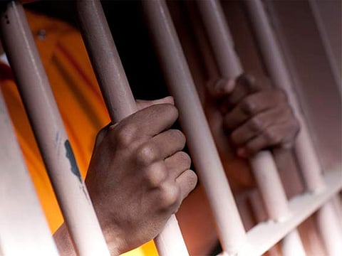 A person in jail. For illustrative purposes only.