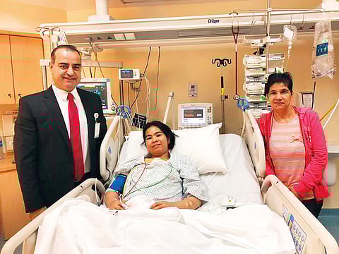 Dr Rafik Abu Samrah with Rose Mary Diaz (in ICU) and a friend.