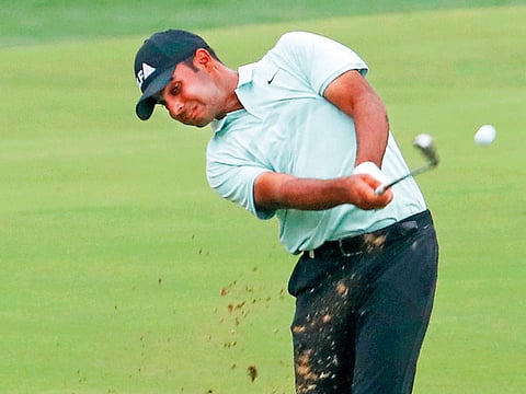Shubhankar Sharma of India plays a shot during day three of the DP World Tour Championship at Jumeirah Golf Estates golf course in Dubai.