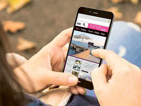 A mobile phone user browses the Internet.