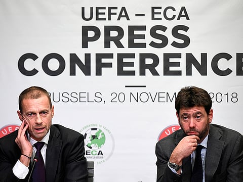 Union of European Football Associations (UEFA) President Aleksander Ceferin (L) gives a joint press conference with chairman of the European Club Association (ECA) Andrea Agnelli, on November 20, 2018 in Brussels.