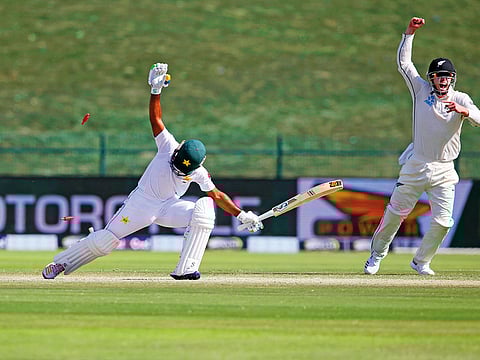A New Zealand player appeals for dismissal of Pakistan’s Assad Shafiq during the first Test in Abu Dhabi on Monday.