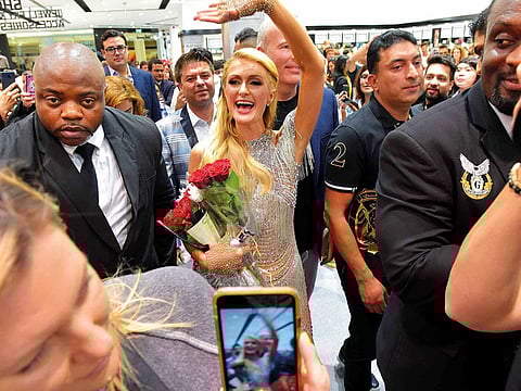 Paris Hilton greets fans as she launched her 24th perfume at Brands 4U in Dubai.