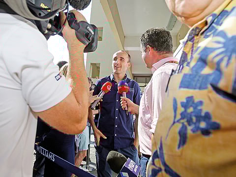 answers to reporters at the Yas Marina racetrack in Abu Dhabi, on Thursday.