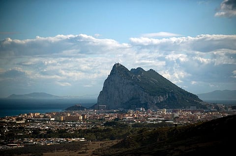 Gibraltar's Rock, seen from the Spanish city of Cadiz, is a British territory and a last sticking point in Britain's EU exit deal