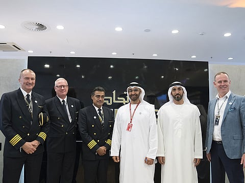 Shaikh Mohammad Bin Zayed with Mohamed Mubarak Al Mazrouei, Undersecretary of the Crown Prince Court of Abu Dhabi and Chairman of Etihad Airways (second from right) at the Etihad Airways stand on the second day of the 2018 Formula 1 Etihad Airways Abu Dhabi Grand Prix, at Yas Marina Circuit.