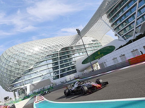Haas F1's Danish driver Kevin Magnussen steers his car during the third practice session at the Yas Marina circuit on November 24, 2018, in Abu Dhabi, ahead of the Formula One Grand Prix.