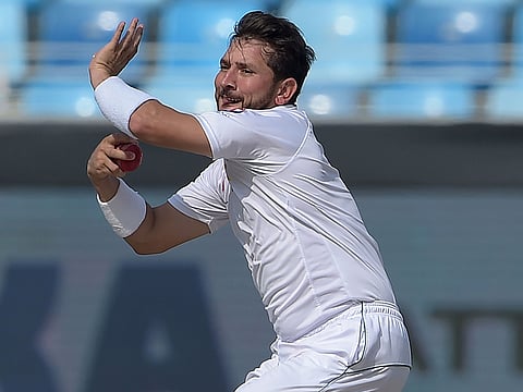 Pakistan's Yasir Shah delivers the ball during the third day of the second Test cricket match between Pakistan and New Zealand at the Dubai International Cricket Stadium in Dubai on November 26, 2018.