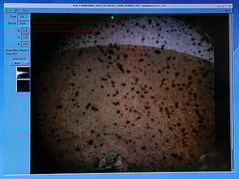 The first picture sent back to NASA's Jet Propulsion Laboratory (JPL) from the spaceship InSight is shown on a video screen at JPL in Pasadena, California, U.S. November 26, 2018.