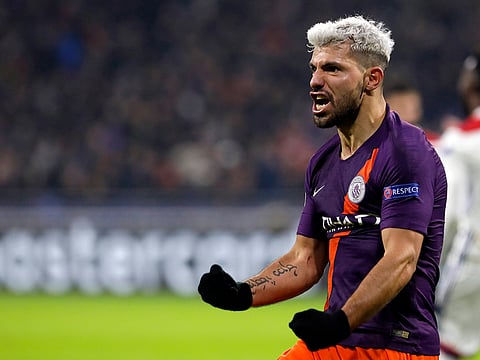 Manchester City forward Sergio Aguero celebrates after scoring his side's 2nd goal