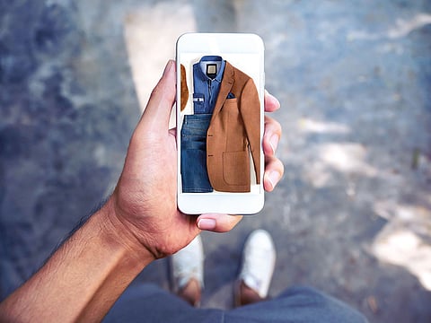 Browsing clothes using an app.