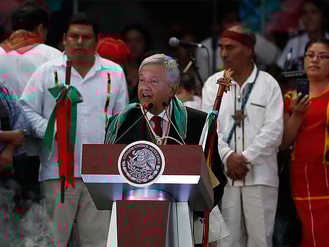 Mexico's new President Andres Manuel Lopez Obrador delivers a speech at the Zocalo, in Mexico City, Saturday, Dec. 1, 2018. Mexicans are getting more than just a new president Saturday.
