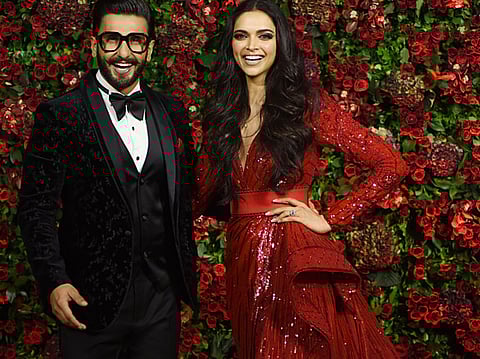 Ranveer Singh and Deepika Padukone pose for a photograph during their wedding reception party in Mumbai.