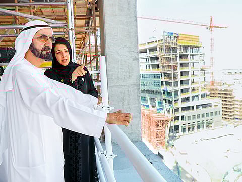 Shaikh Mohammad is briefed by Reem Ebrahim Al Hashemi, Minister of State for International Cooperation, and Director-General of Dubai Expo 2020 Bureau about progress on-site and key initiatives.