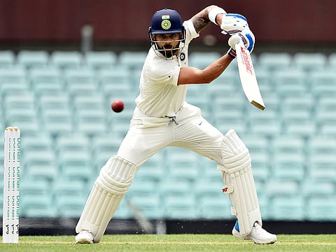 Virat Kohli plays a shot on the second day of the tour match against Cricket Australia XI at the SCG in Sydney on November 29, 2018.