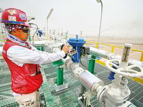 A degassing station in the Zubair oil and gas field, Iraq. Iraq pledged to work to help balance markets and bolster prices.