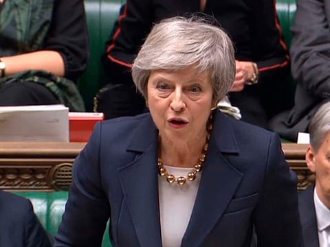Britain's Prime Minister Theresa May speaks in parliament at the start of a five-day debate on the Brexit European Union Withdrawal Agreement, Tuesday Dec. 4, 2018.