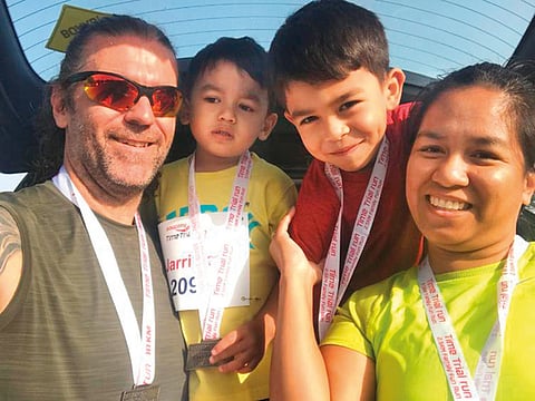 Robert Webling with his wife and sons. From being obese and a smoker, Webling is today a Spartan racer. He smoked his last cigarette on New Year’s Eve 2010.