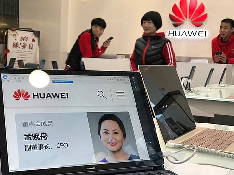 A profile of Huawei's chief financial officer Meng Wanzhou is displayed on a Huawei computer at a Huawei store in Beijing, China, Thursday, Dec. 6, 2018.