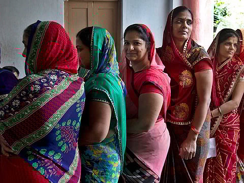 Indian women stand in a queue to cast their votes in Hyderabad in a file picture. The report, titled ‘Impacts of Covid-19 on women in low-income households in India’ conducted by social impact advisory group Dalberg, captures the experiences and perspectives of nearly 15,000 women in 10 states including Telangana.