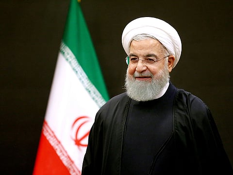 Iran's President Hassan Rouhani has dismissed central bank governor Abdolnaser Hemmati, who is running in the presidential election in June.