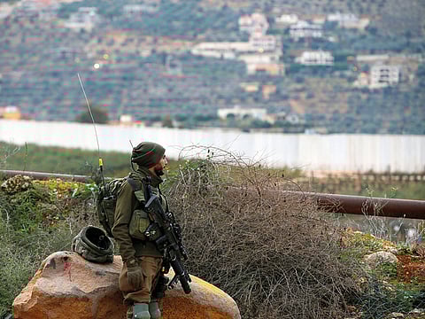 An Israeli soldier in Metula town near the frontier with Lebanon, the morning after the military said it had launched an operation to thwart cross-frontier attack tunnels from Lebanon.