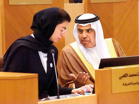 Obaid Humaid Al Tayer with Noora Mohammad Hilal Al Kaabi, Minister of Culture and Knowledge Development, during the FNC session.